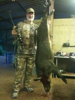 Dave with 164lb boar.JPG